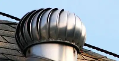 attic fan installation services with professionally installed roof ventilation unit in Miami, FL