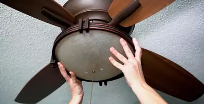 Ceiling fan repair and reinstallation on ceiling mount in Miami, FL