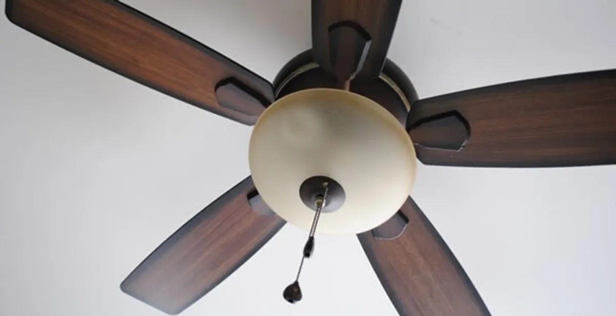 Fully installed ceiling fan with balanced blades and light fixture in Miami, FL
