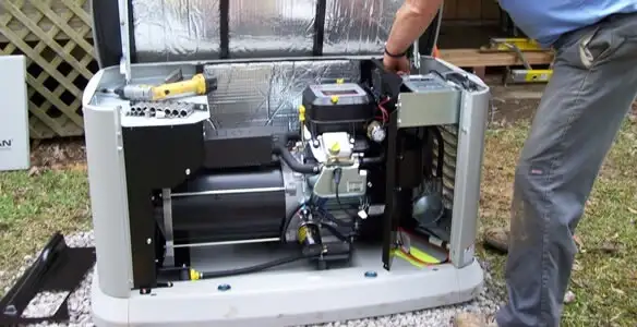 generator installation service showing technician connecting and configuring generator components in Miami, FL