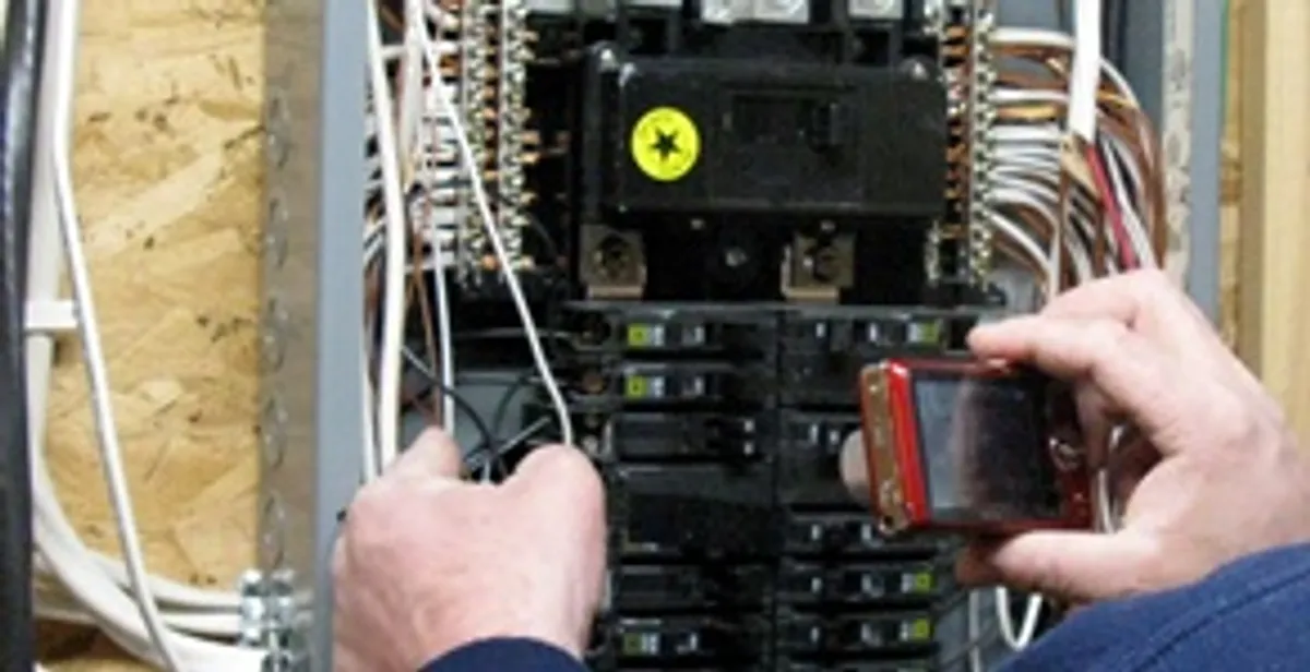 Home electrical inspection of circuit breaker panel by licensed electrician in Miami, FL