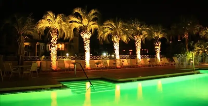 landscape lighting installation services illuminating outdoor recreational areas in Miami, FL