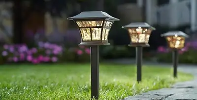 landscape lighting installation services with professionally installed pathway lights in Miami, FL