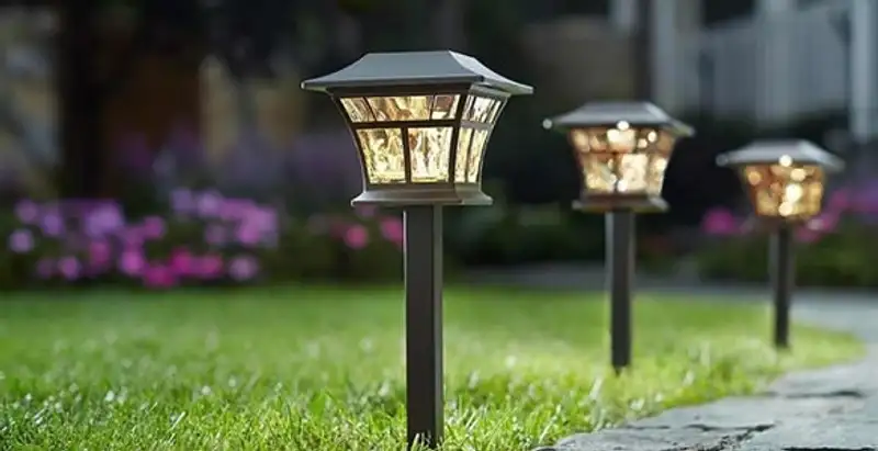 landscape lighting installation services with professionally installed pathway lights in Miami, FL