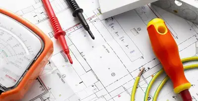 licensed electrician planning and testing electrical systems using professional tools in Miami, FL