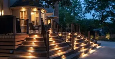 Residential electrician installing outdoor lighting for home safety in Miami, FL