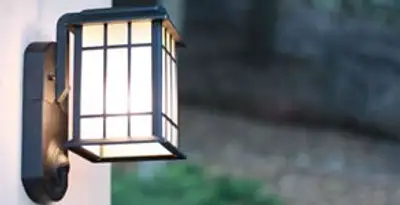 security light installation services with professionally mounted exterior wall light in Miami, FL