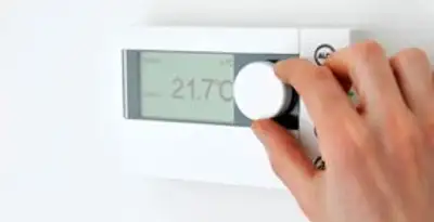 Thermostat installation service with professional adjusting temperature control in Miami, FL