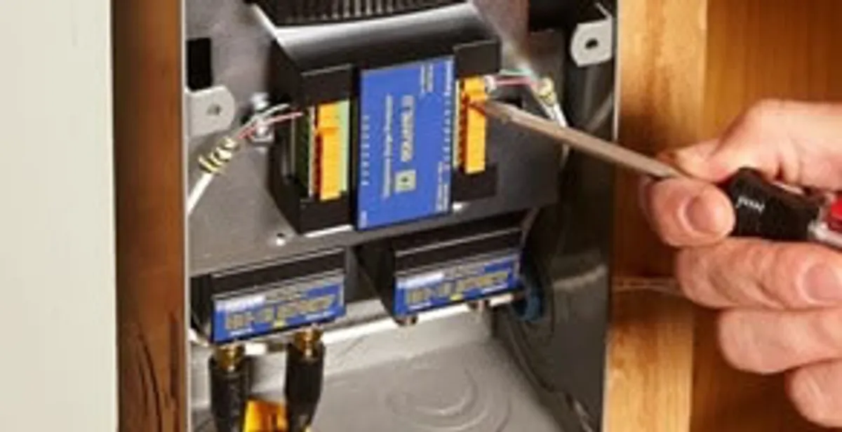 Whole home surge protection device being installed by a licensed electrician to protect electrical systems in Miami, FL